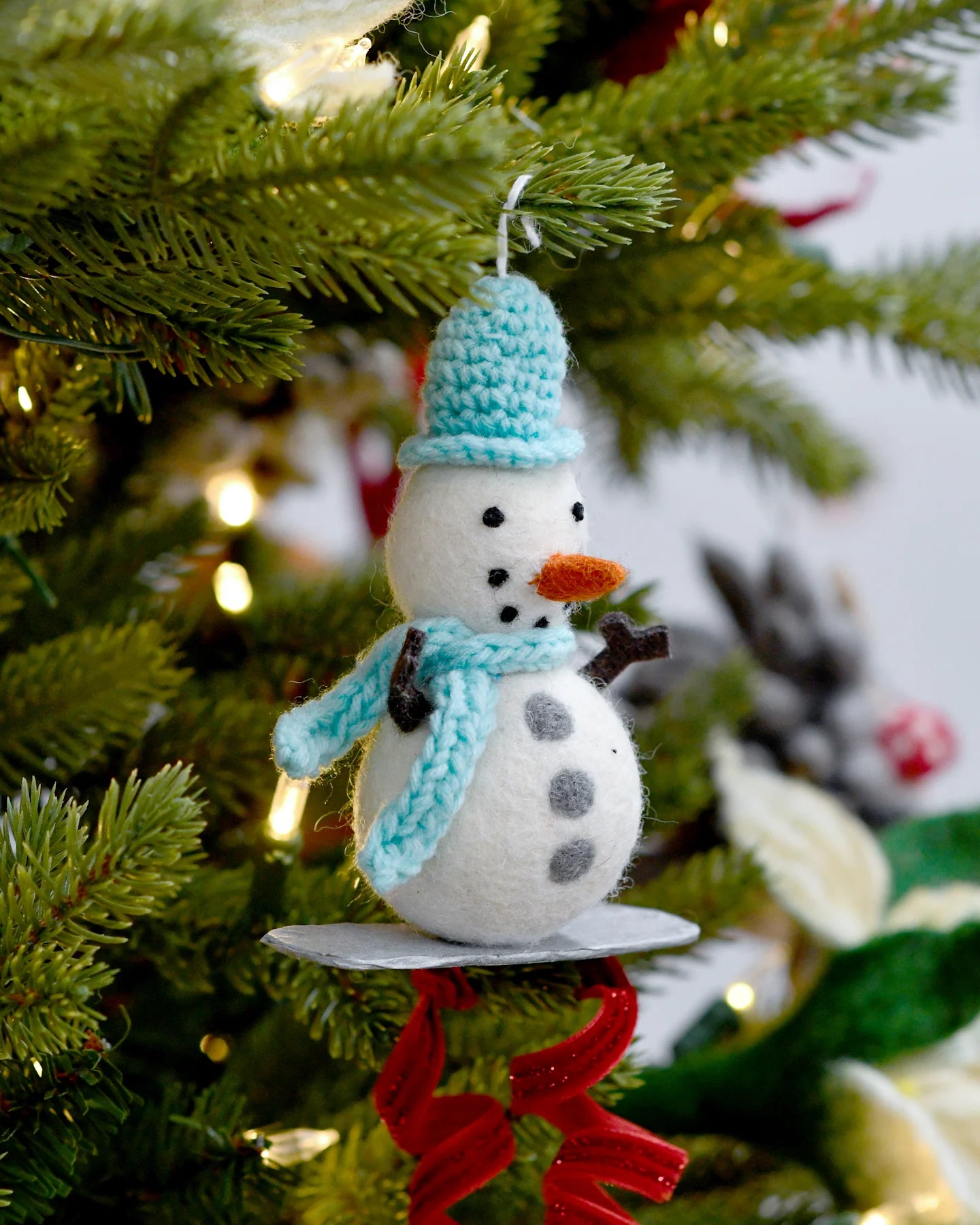 Tara Treasures | Felt Snowman on Snowboard Ornament